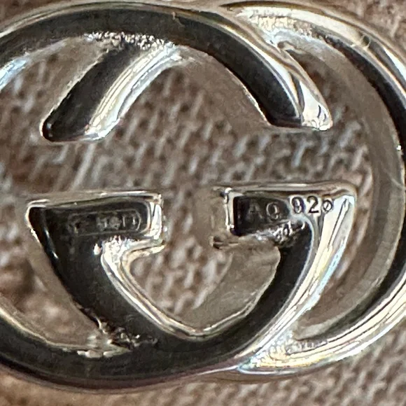 NWT Gucci interlocking GG sterling silver earrings with pouch and box